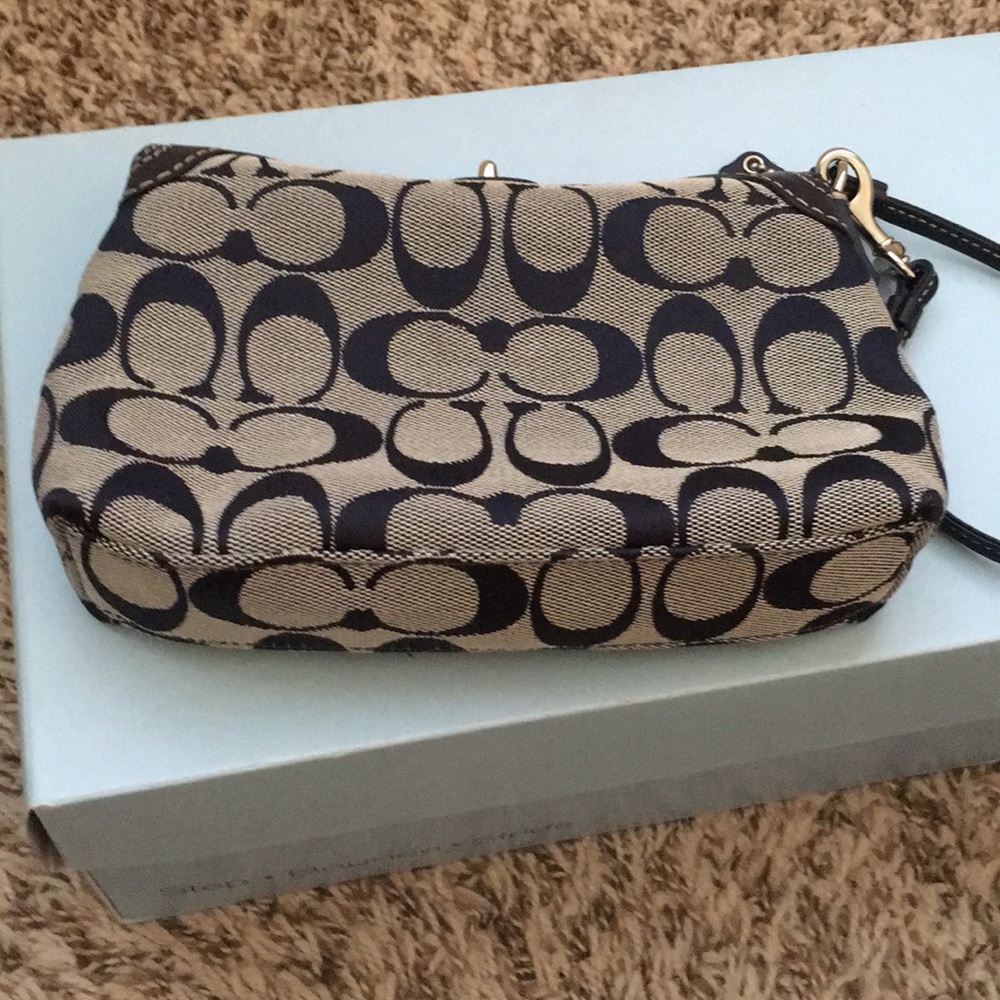 Coach Signature Turnlock Wristlet